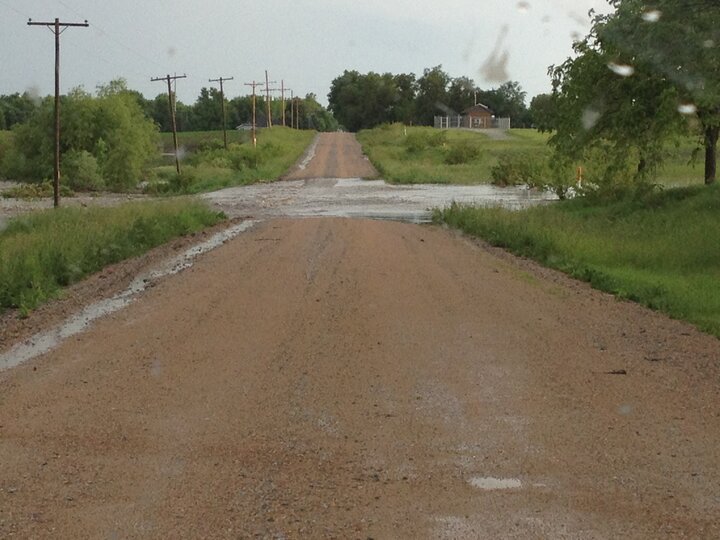Flood waters across a road