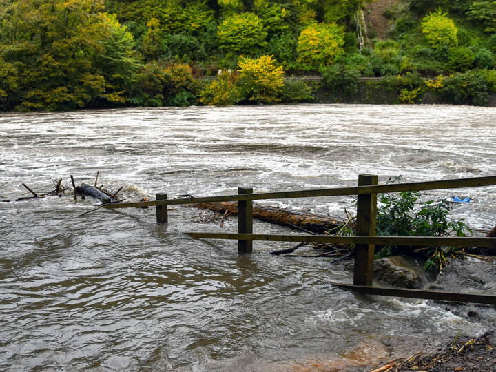 flood waters with a fence in it